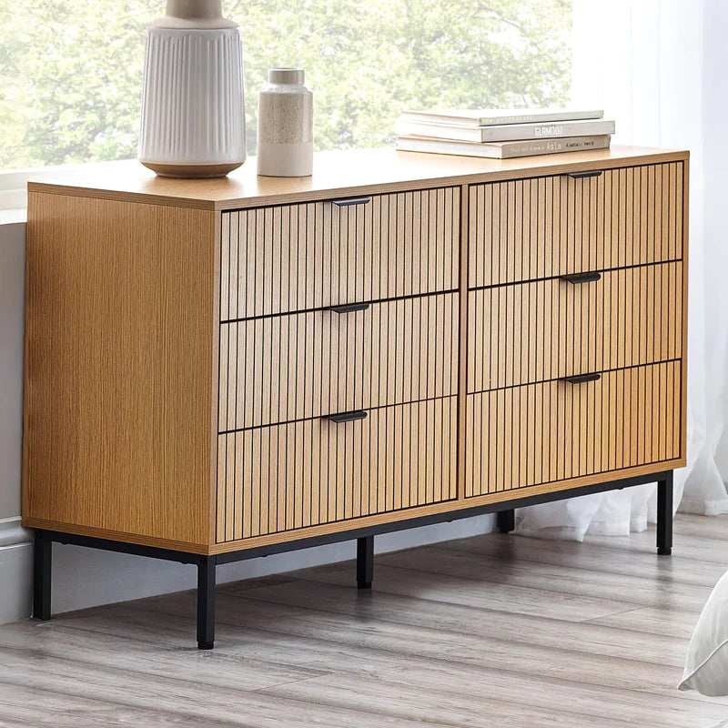 Wooden dresser with white top on a white background