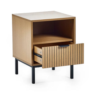 Wooden side table with open drawer on a white background