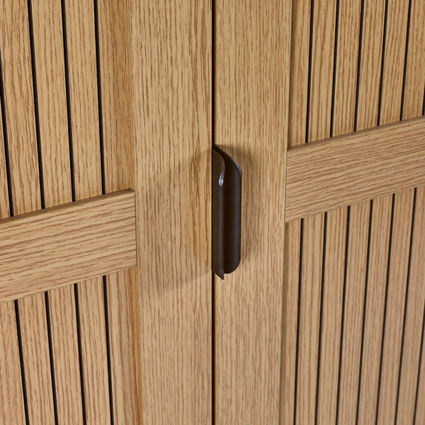 Close-up of a wooden cabinet with a handle