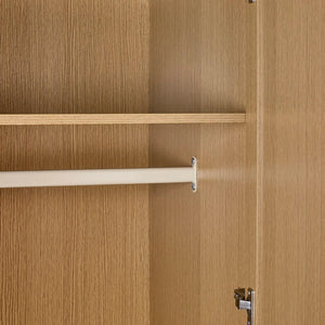 Wooden wardrobe with two shelves and a metal rod.