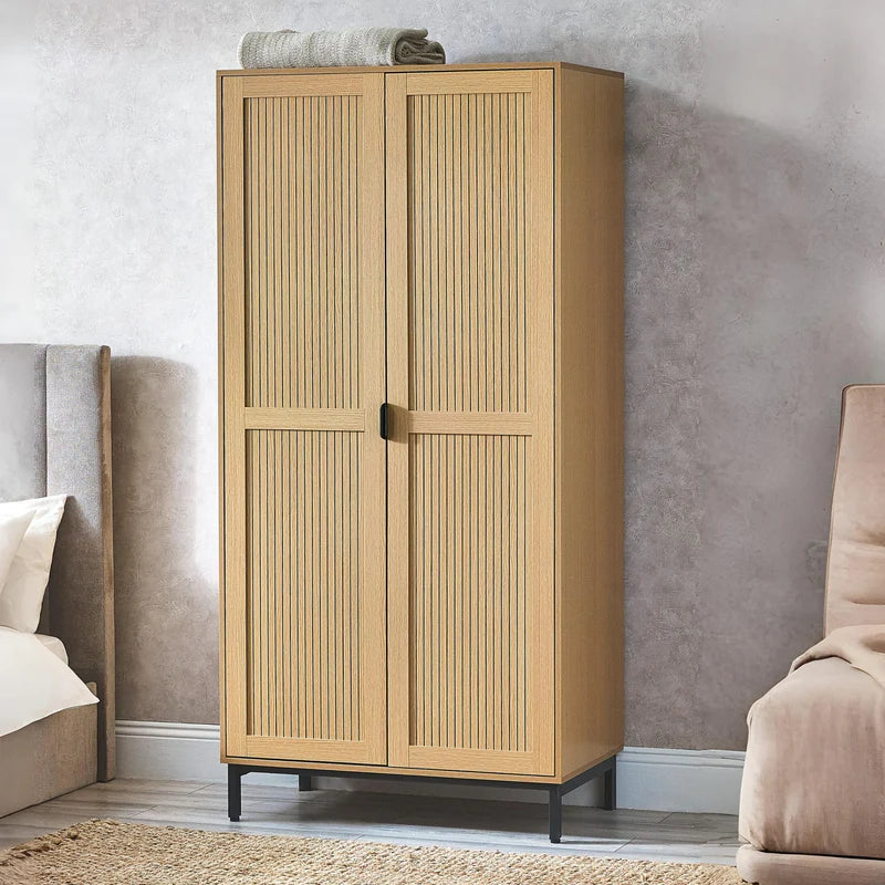 Wooden wardrobe with two doors on a white background