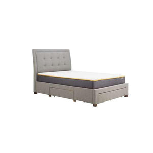 Gray upholstered bed with mattress on a white background