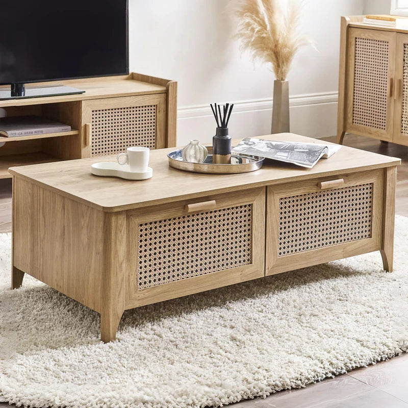 Wooden coffee table with rattan doors on a white background