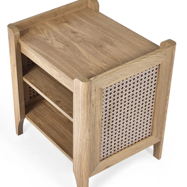 Wooden side table with wicker patterned door on a white background