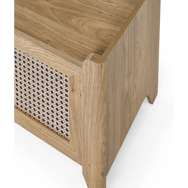 Wooden side table with wicker basket on a white background