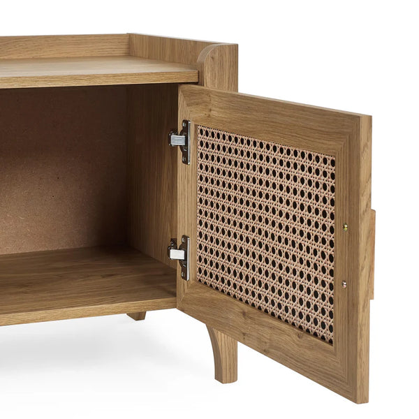 Wooden cabinet with open door featuring a decorative grille on a white background
