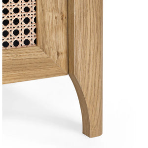 Wooden furniture corner with a patterned fabric panel on a white background