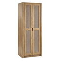 Wooden wardrobe with rattan-style mesh doors on a white background