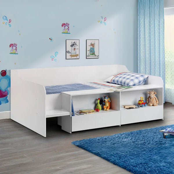 White children's bed with storage drawers in a room with blue walls and toys.