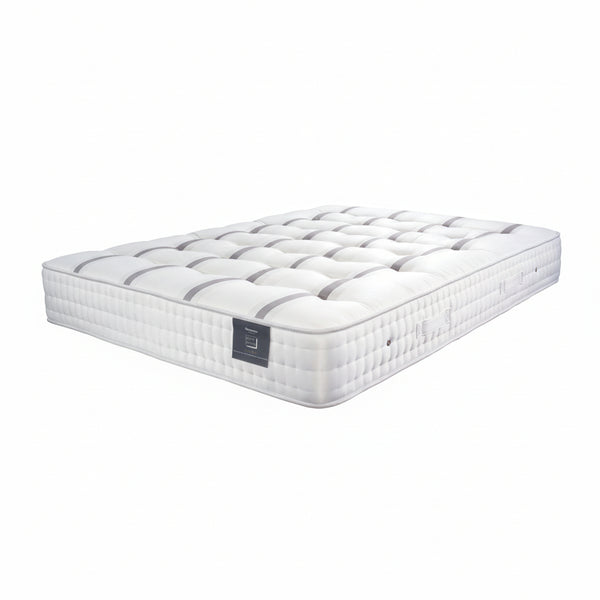 White mattress with a brand logo on a white background