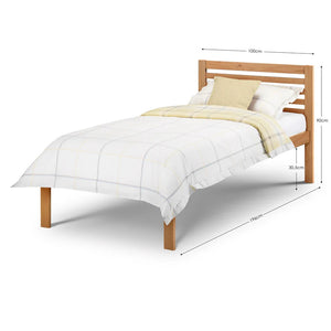 Wooden bed frame with white bedding and a yellow blanket on a white background