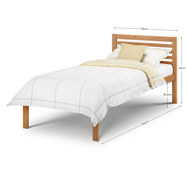 Wooden bed frame with white bedding and a yellow blanket on a white background