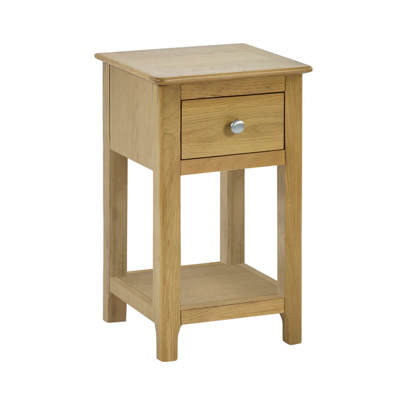 Wooden side table with a drawer on a white background
