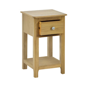 Wooden side table with a drawer on a white background