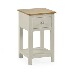 Small side table with wooden top and drawer on a white background