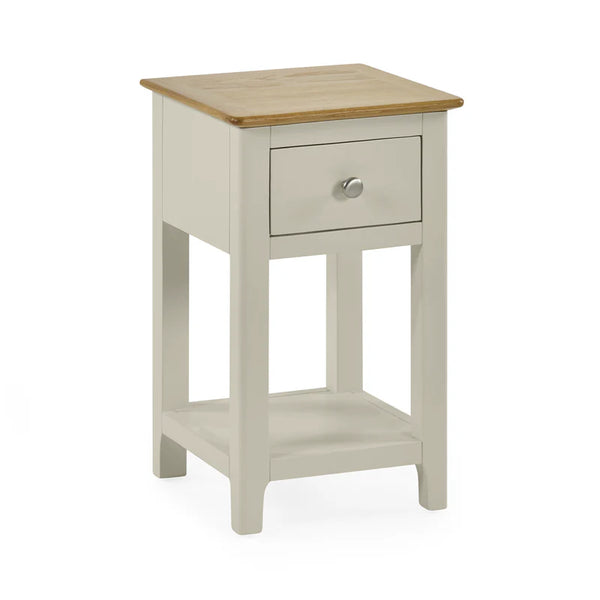 Small side table with wooden top and drawer on a white background