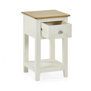White side table with a wooden top on a white background