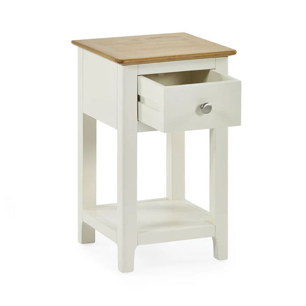 White side table with a wooden top on a white background