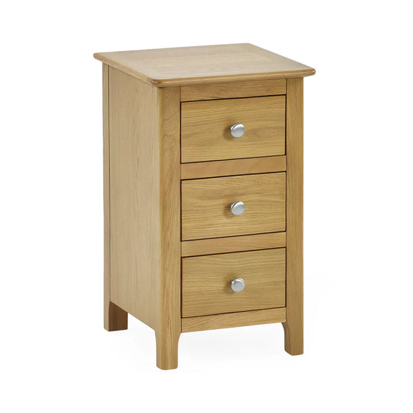 Wooden nightstand with three drawers and silver knobs on a white background