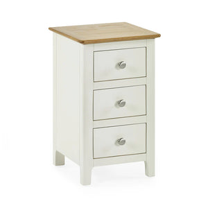 White three-drawer nightstand with a wooden top on a white background