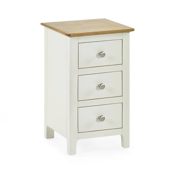 White three-drawer nightstand with a wooden top on a white background