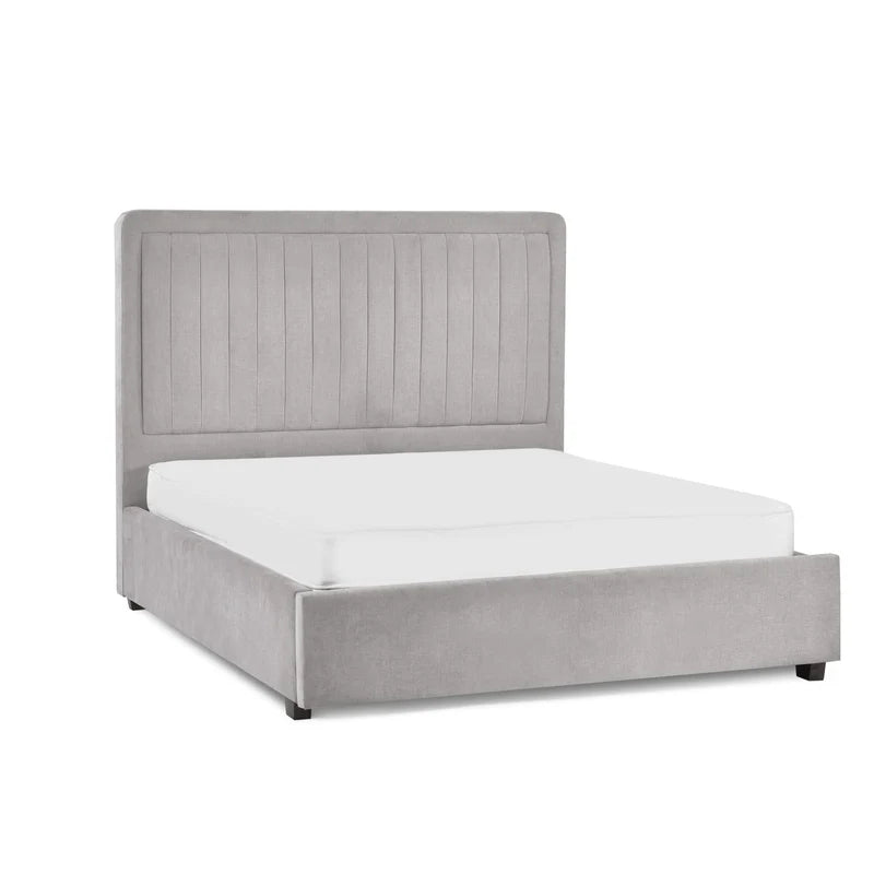 Gray upholstered bed with white mattress on a white background
