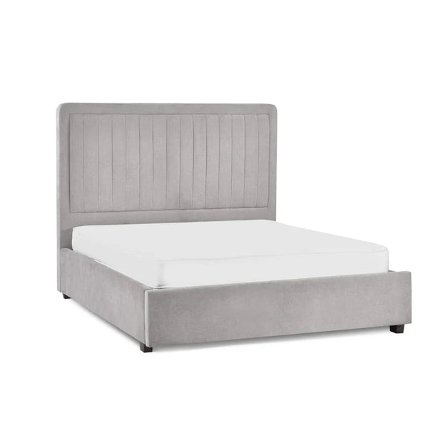Gray upholstered bed with white mattress on a white background