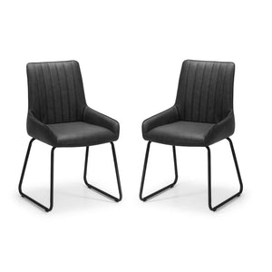 Two grey chairs with metal legs on a white background