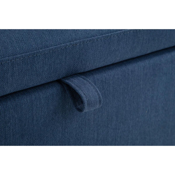 Close-up of blue fabric with a subtle texture on a white background
