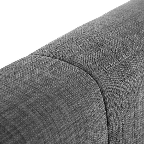 Close-up of a gray fabric surface with a subtle pattern