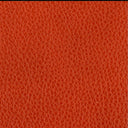 Close-up of a textured orange leather surface