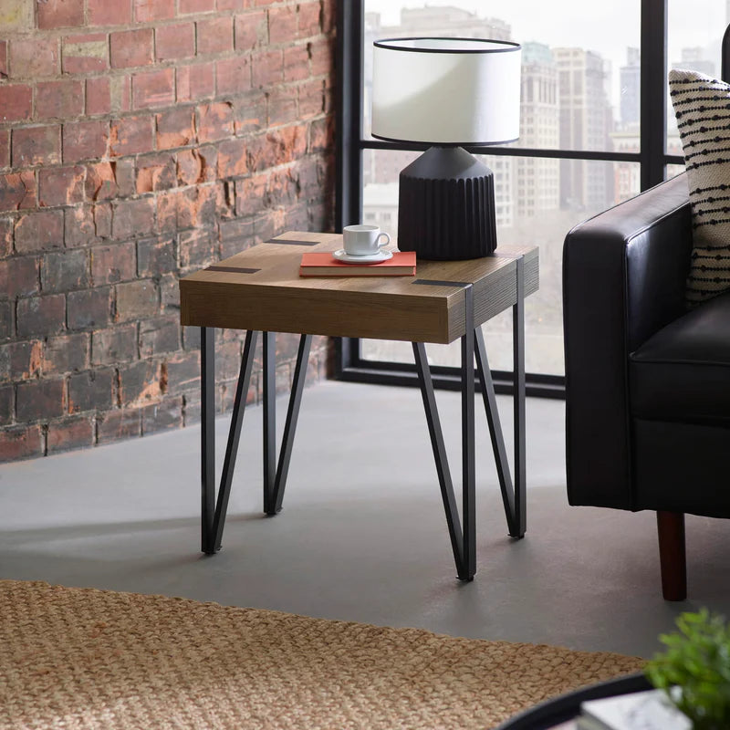Wooden side table with metal legs on a white background