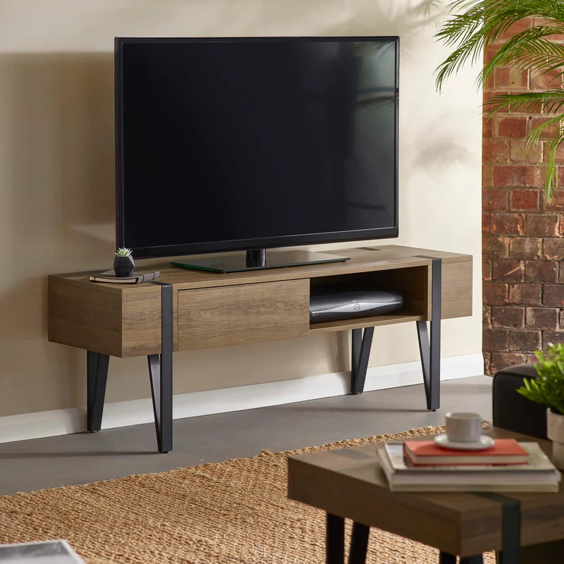 Wooden TV stand with black metal legs on a white background