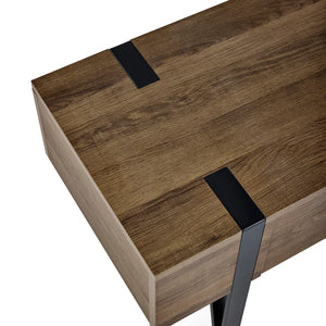 Wooden desk with black metal legs on a white background