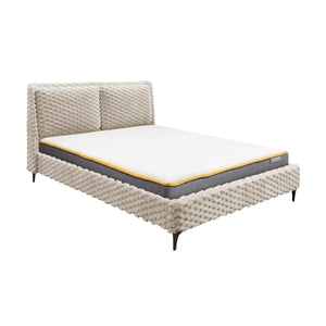 Textured fabric bed frame with mattress on a white background