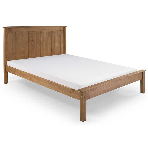 Wooden bed frame with a white mattress on a white background