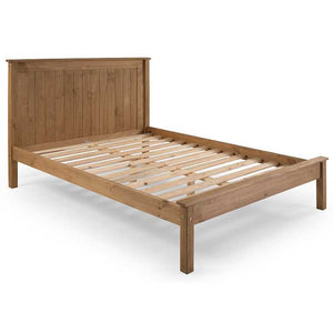 Wooden bed frame on a white background