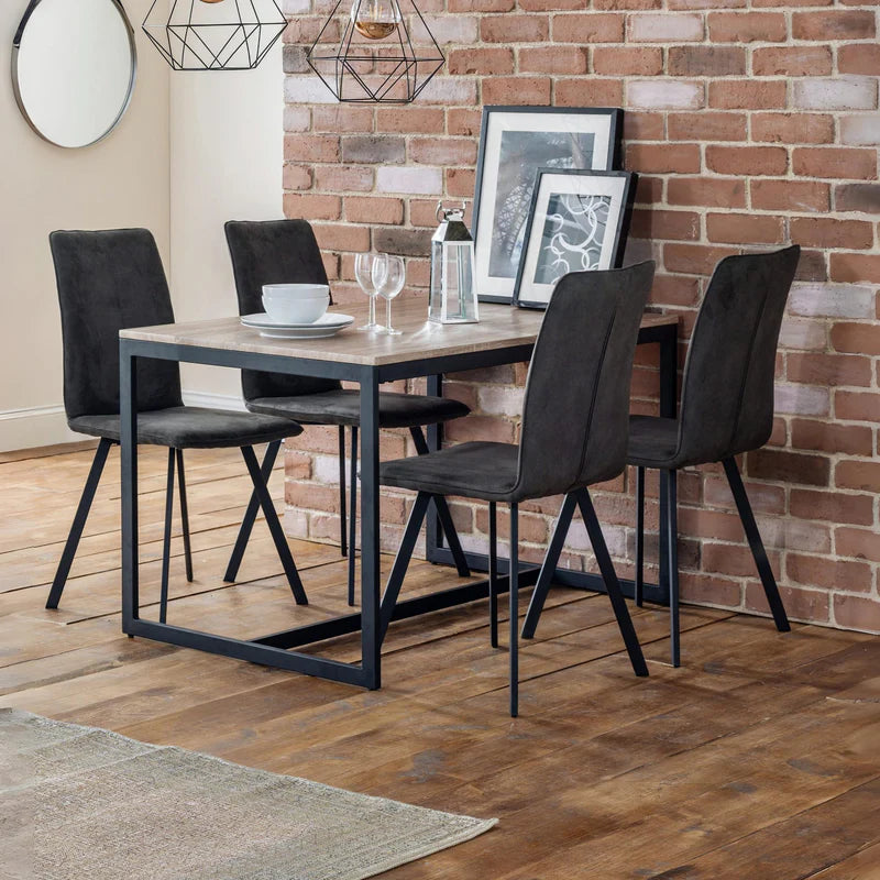 Wooden table with black metal frame on a white background