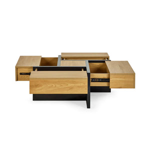 Wooden coffee table with open drawers on a white background