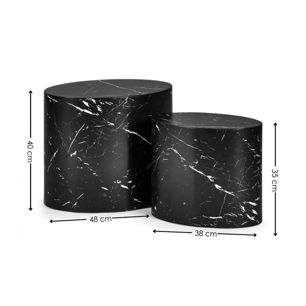 Two black marble cylindrical stools with measurements on a white background