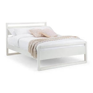 White bed frame with bedding and a pillow on a white background