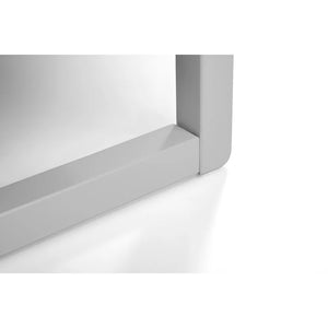 White rectangular object with a reflective surface on a white background
