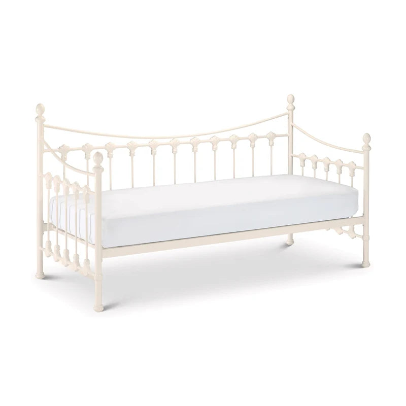 White metal bed frame with a mattress on a white background
