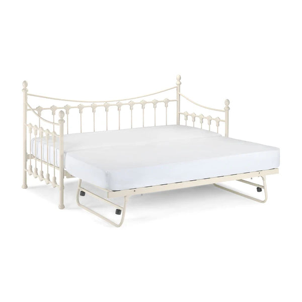 White metal bed frame with mattress on a white background