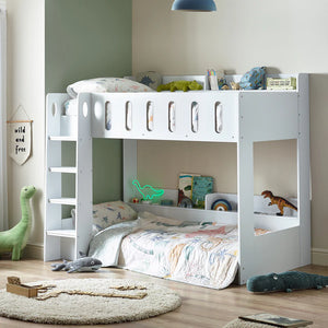 Children's bedroom with a white bunk bed, toys, and decor.