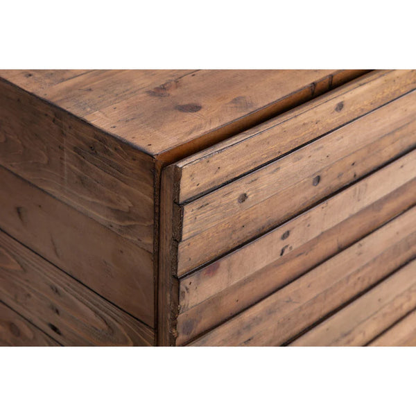 Close-up of a wooden drawer with a rustic finish