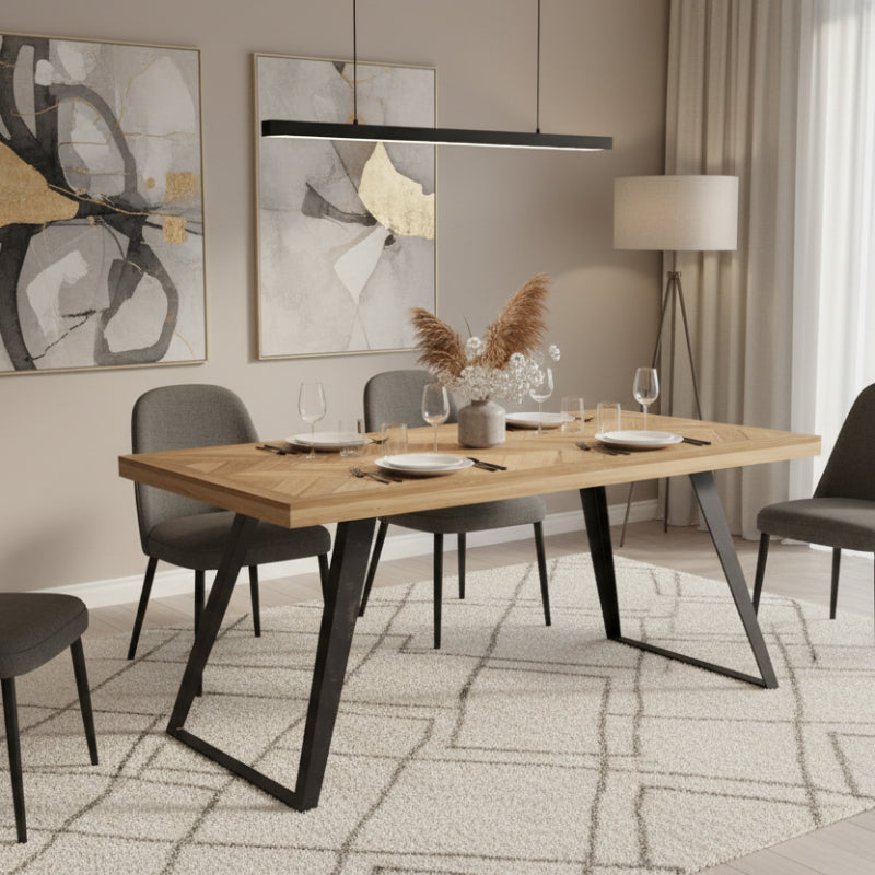 Wooden table with black metal legs on a white background
