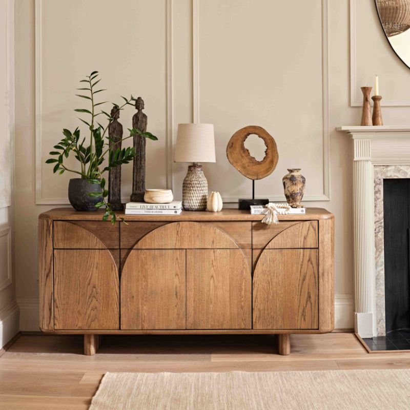 Wooden sideboard with curved design on a white background