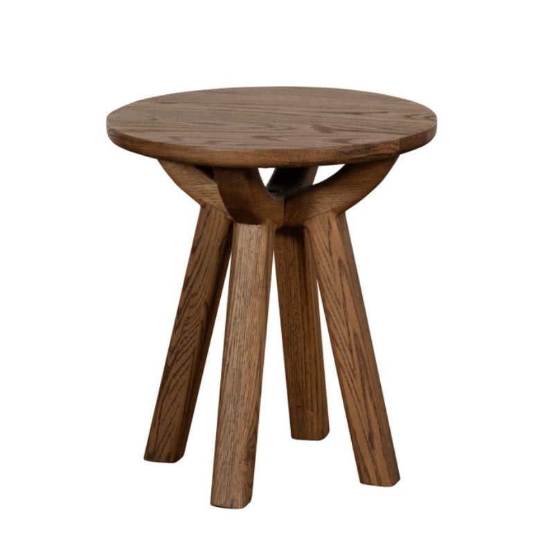 Wooden side table with a round top and four legs on a white background