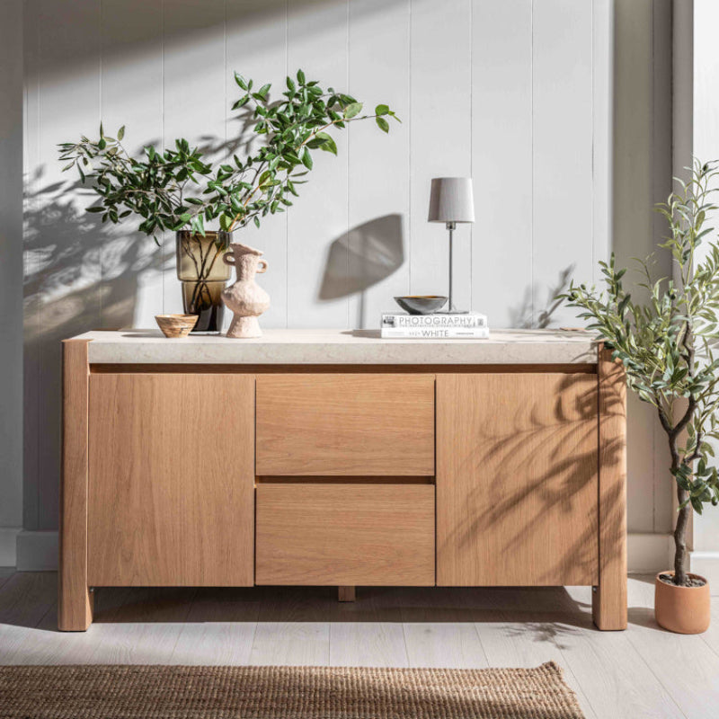 Wooden sideboard with a light finish on a white background